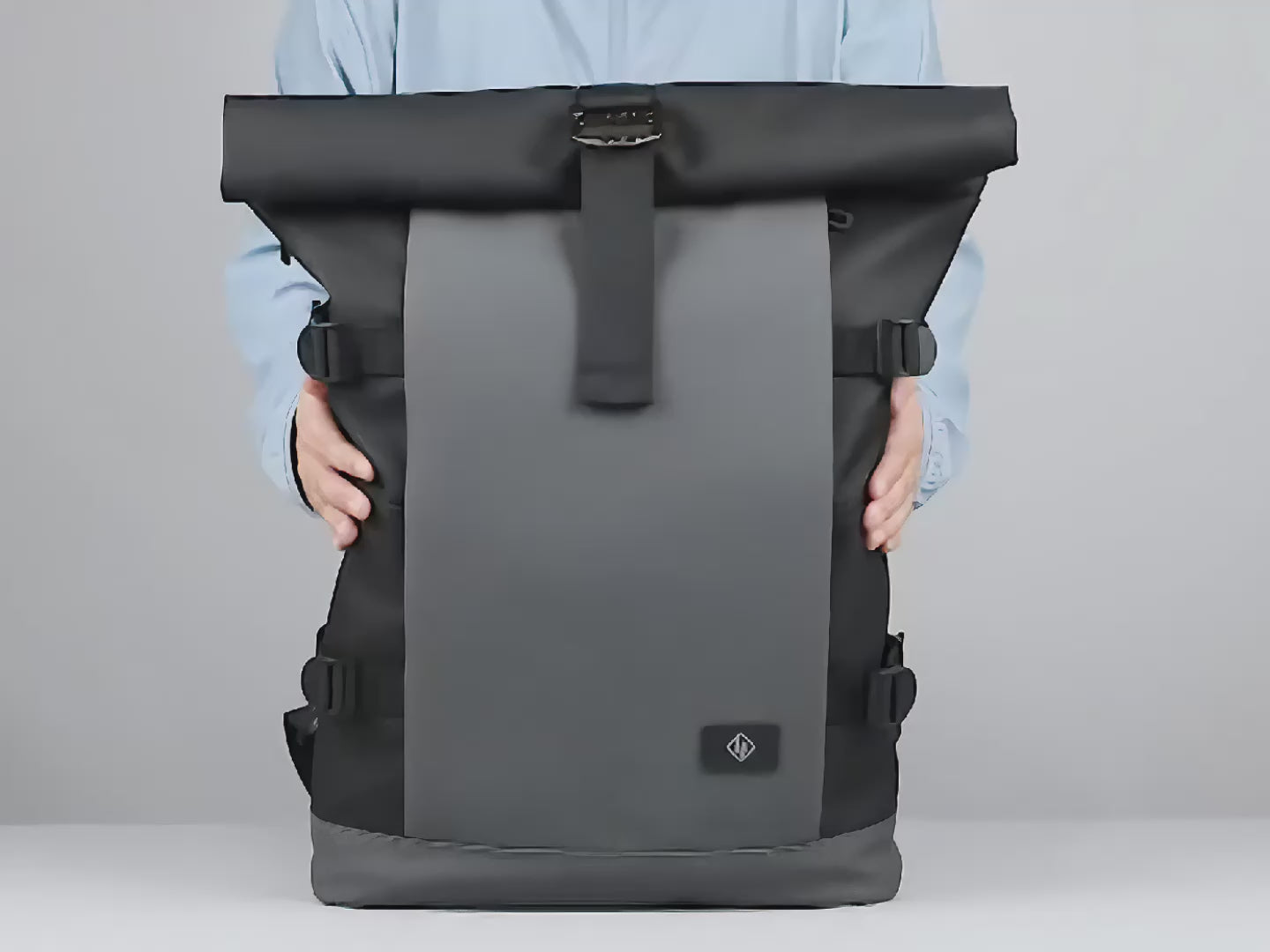 Load video: the roll top compact backpack - 18L to 25L